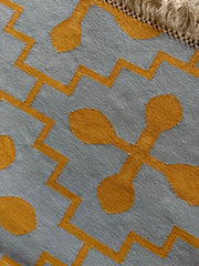 The Buttercross rug, blue and orange